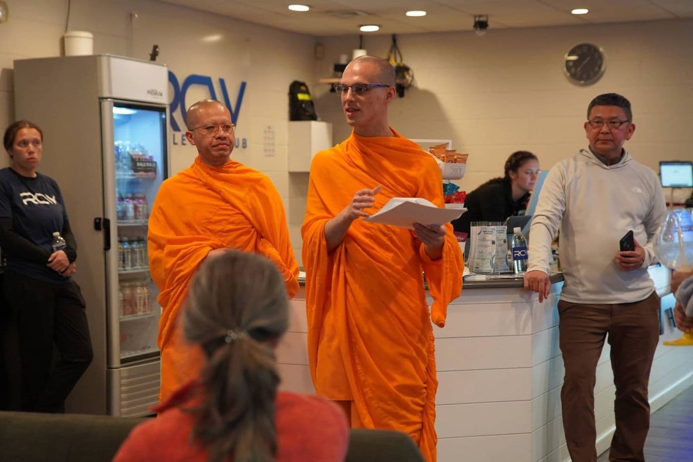 Venerable Michael speaking with RCW staff in the club lounge
